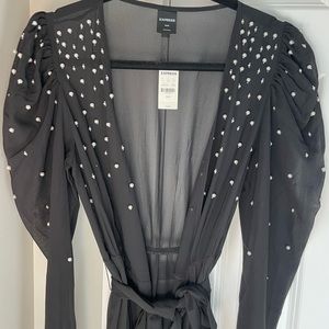 Adorable fancy jacket piece! Great for a date night or special occasion!